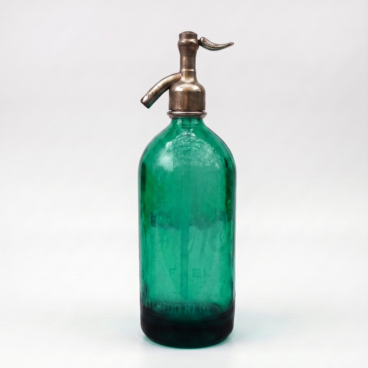 Petite Green — Miniature green vintage Argentine seltzer bottle, 5.9 inches tall, with polished siphon top.