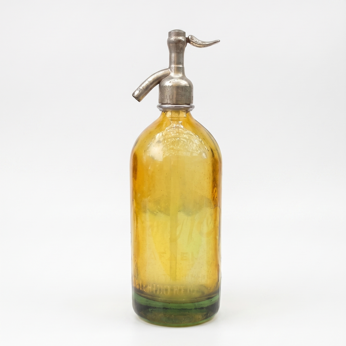 Petite Yellow — Miniature yellow vintage Argentine seltzer bottle, 15 cm tall, with polished siphon top