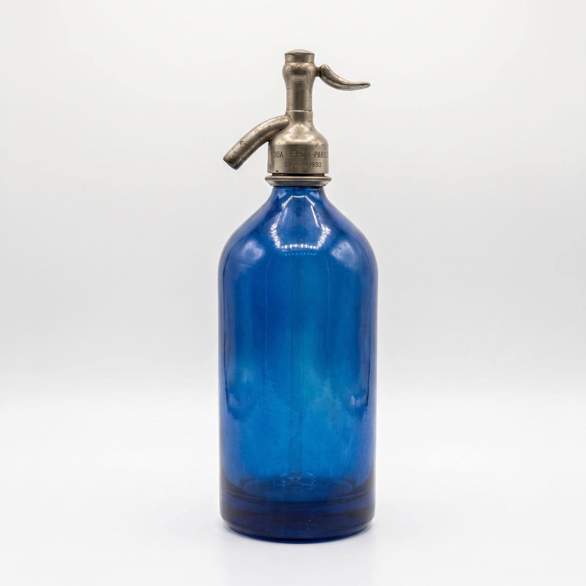 Petite Blue — Miniature blue vintage Argentine seltzer bottle, half liter, with restored metal siphon