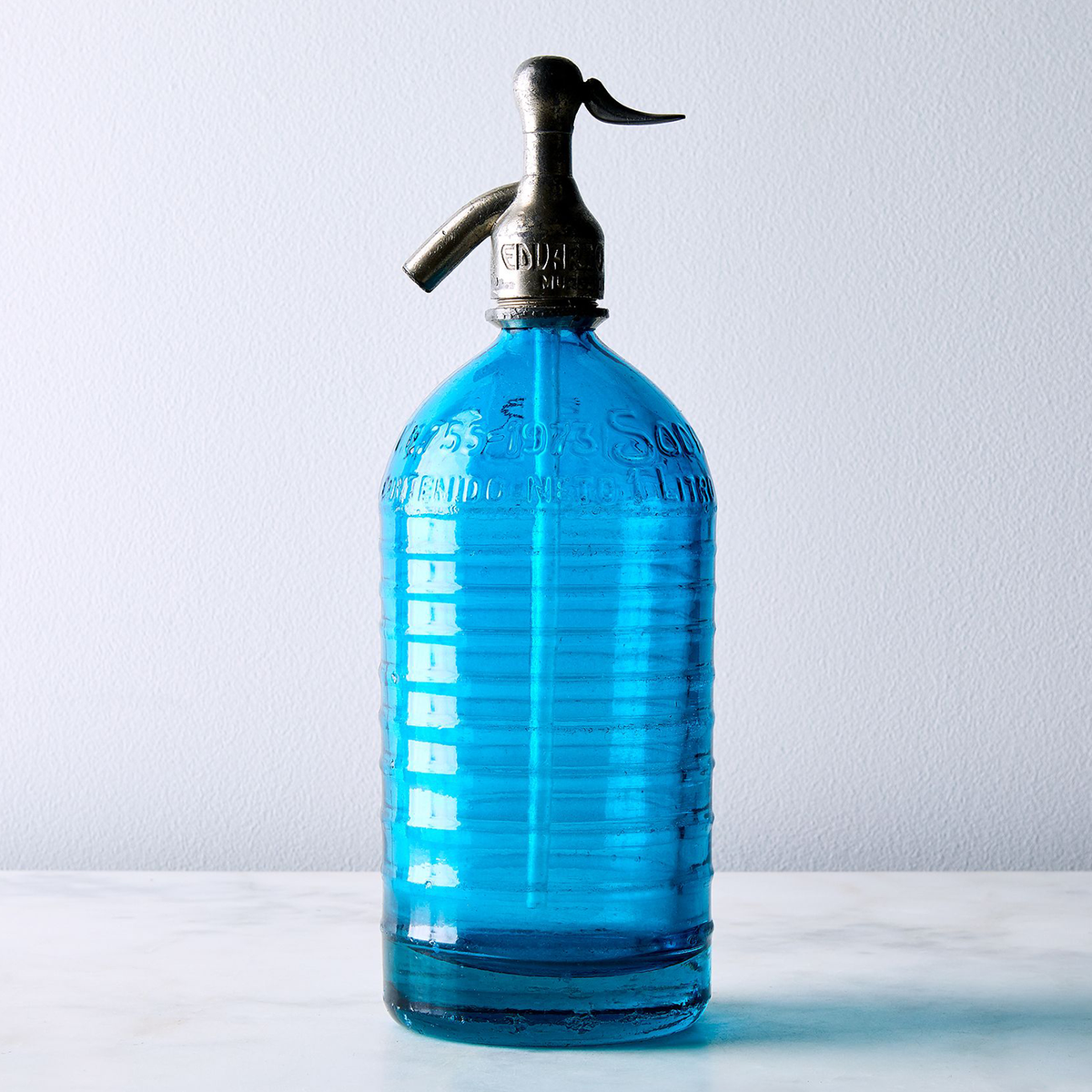 Deep blue hand-dipped Lourdes vintage Argentine seltzer bottle with ribbed 1930s glass